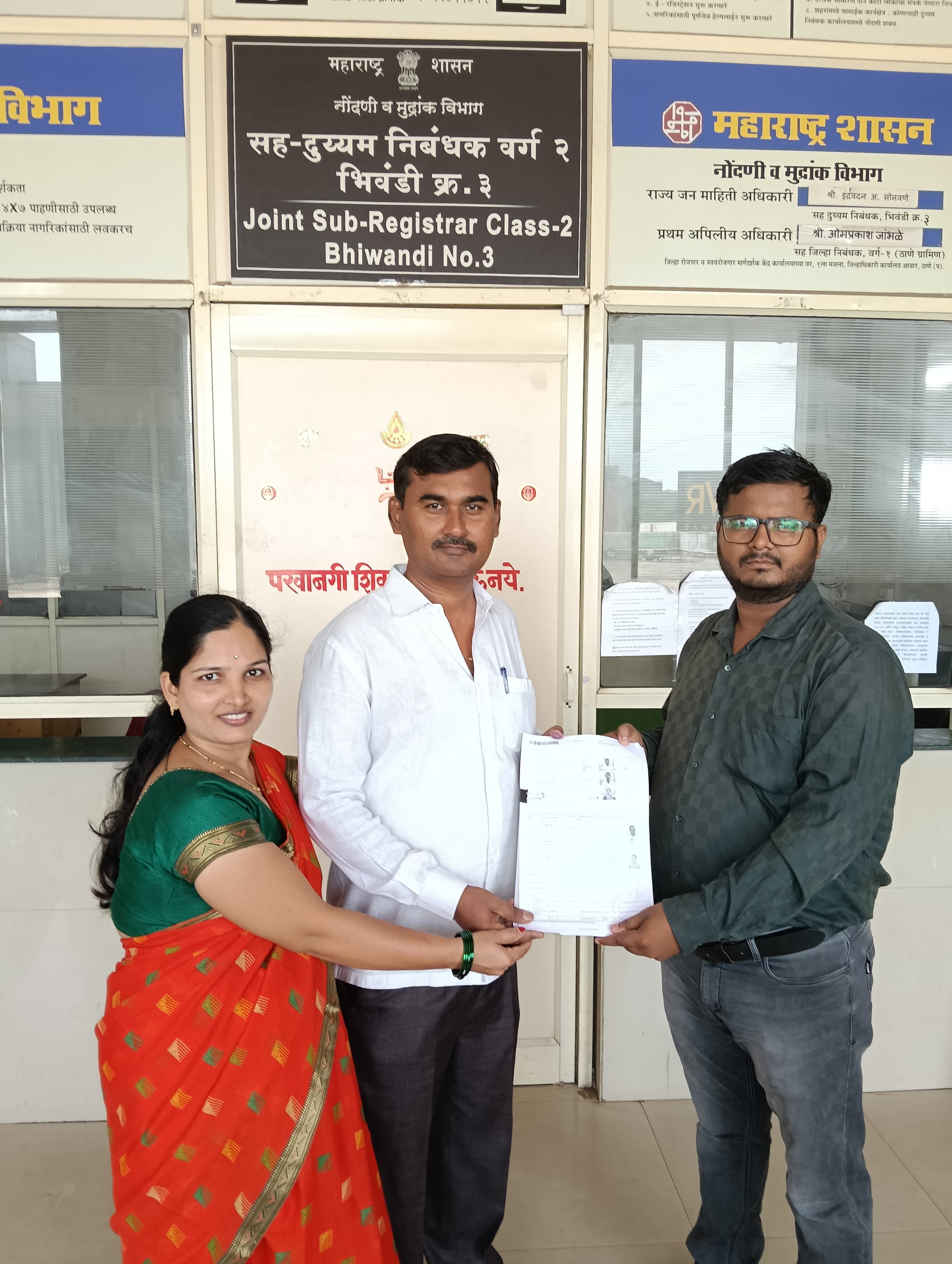 Happy family registering their home at Vivaan Realty